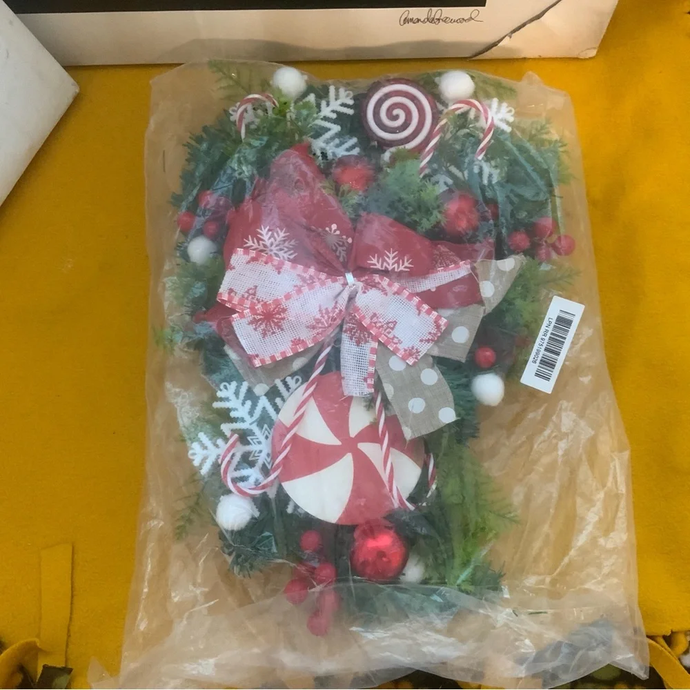 Holiday artificial Christmas teardrop swag for inside or outside decoration